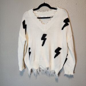 MOD On Trend Cream Black Lightning Bolt Distressed Frayed V Neck Sweater